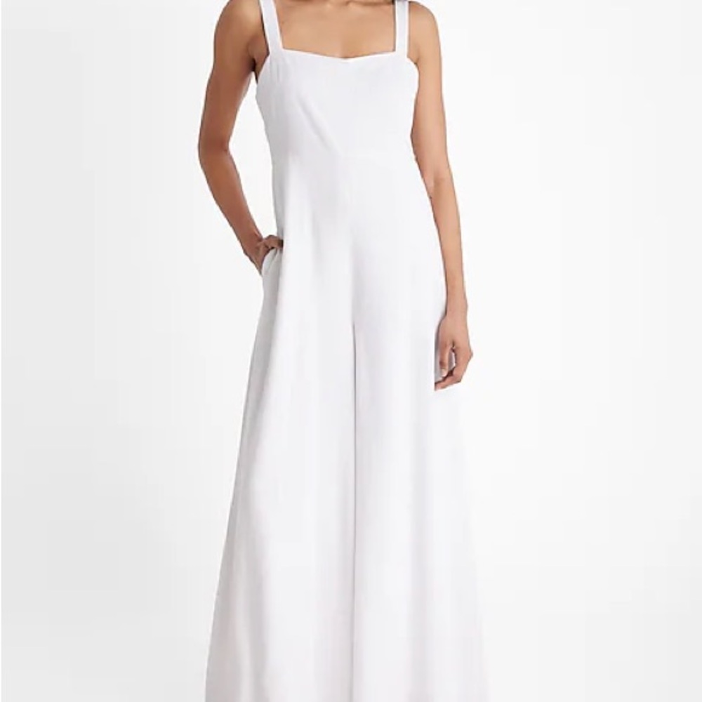 Express White Jumpsuit with Spaghetti Straps and Wide-Leg Design